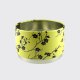Yellow stackable tea tin with plum blossom decoration