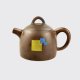 Handmade dome shaped Jianshui clay teapot with Mei Leaf Blue & Yellow square design. |