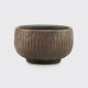 Chunky and stylish 75ml Jianshui clay cup with a tree bark textured pattern.