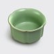 Low profile 45ml Ru Yao porcelain cup with soft vertical ridges and six curved rims.