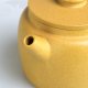 Authentic Golden Duanni clay barrel pot from Master Xu with our exclusive 'Connections' engraving. Approx 180ml.