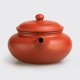 Pure Zhuni Yixing Zisha clay pot crafted in a very traditional ancestral form with a natural textured surface. 120ml